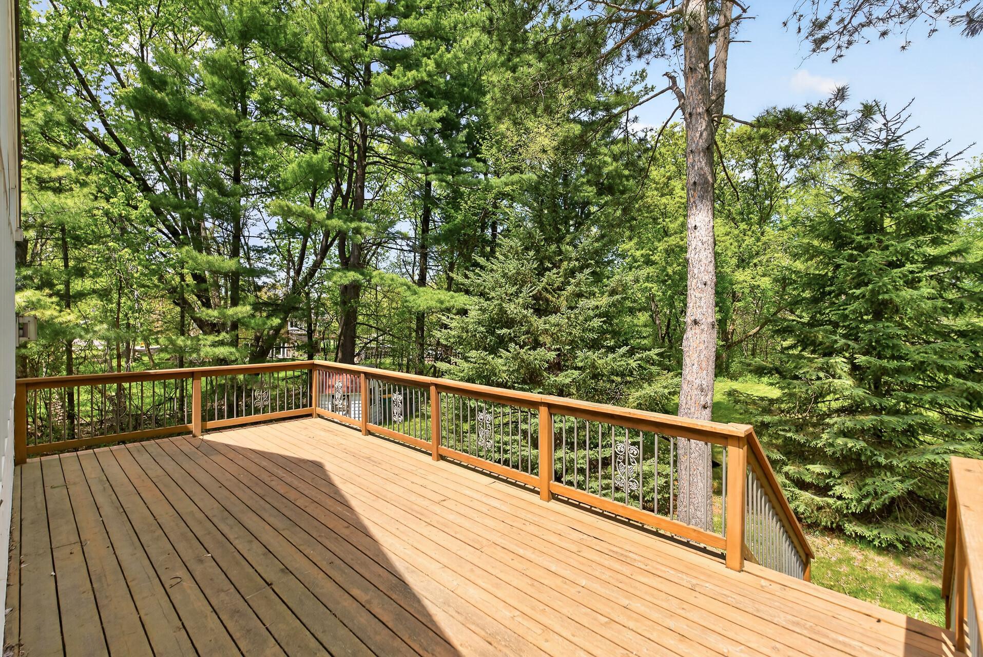 Spacious deck perfect for outdoor meals and evening relaxation!
