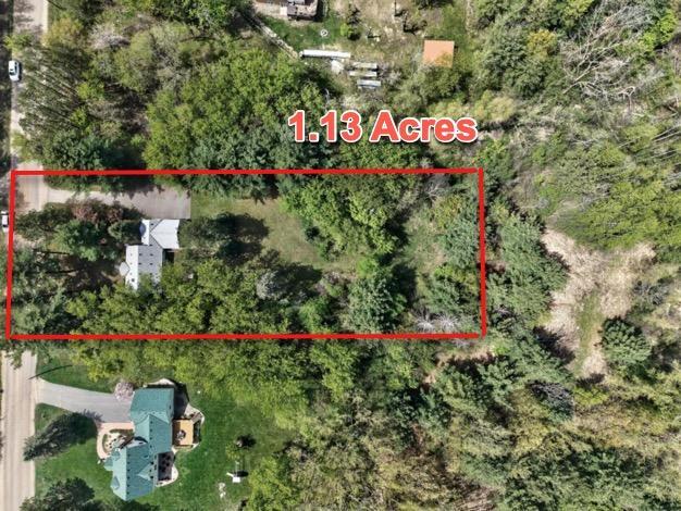 1.13 Acres of Privacy and Serenity!