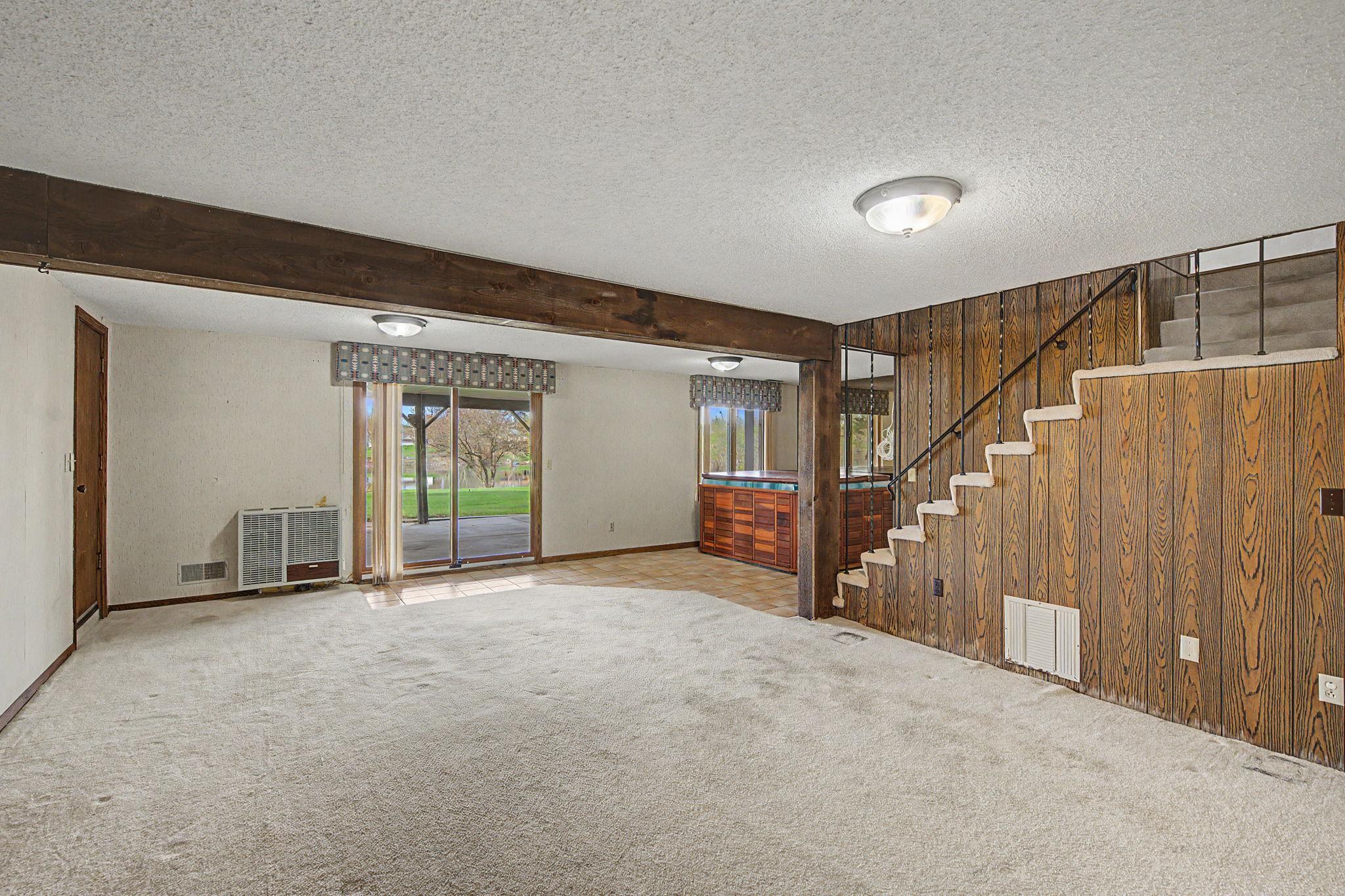 Lower level walk out and door to the left is access to the garage.