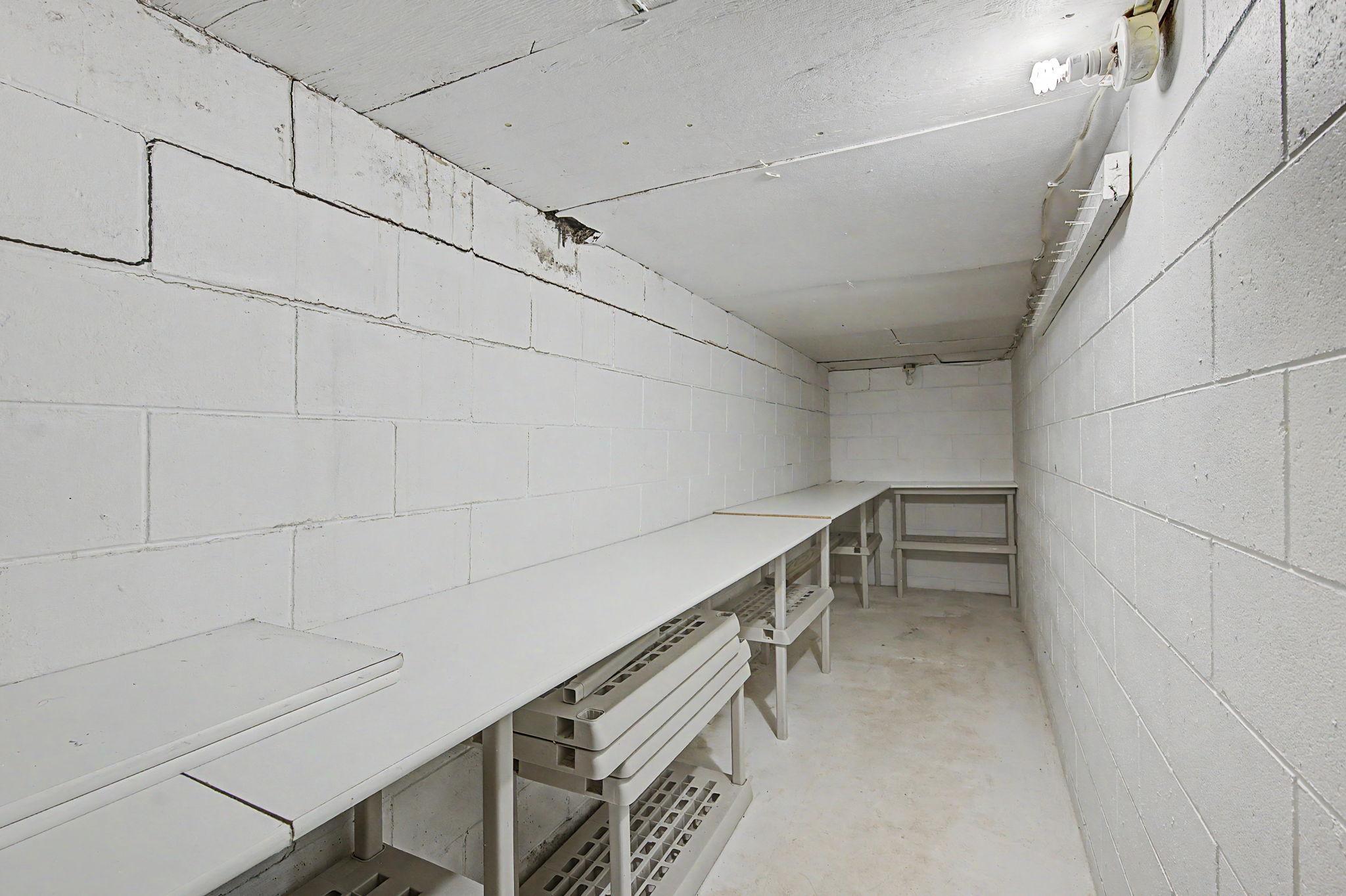 The lower level cellar with more storage.