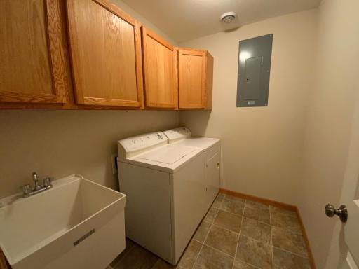 Lower level laundry room with lots of storage!