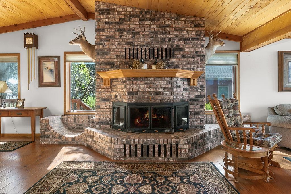 Boasting Brick Fire place in main living area!