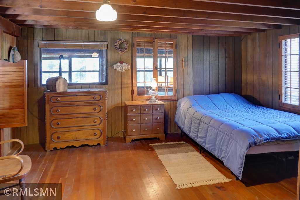 Large main floor bedroom overlooks the porch.