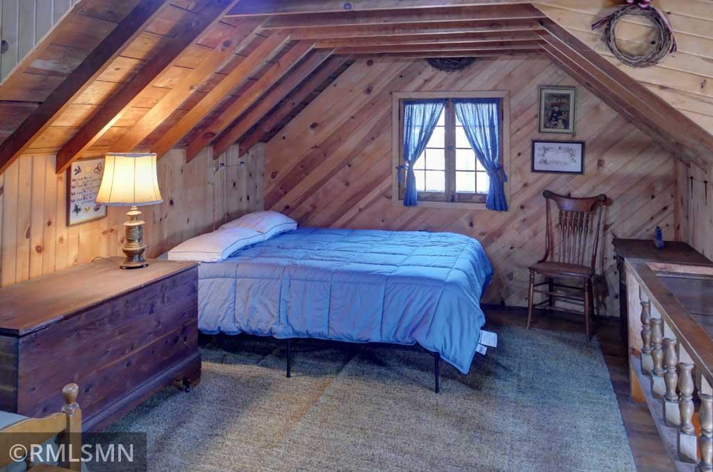 Upstairs with storage behind the sidewalls.