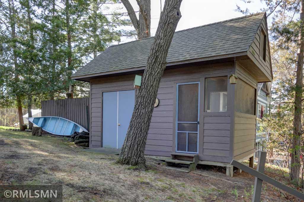 Great 9 x 18 storage shed with the lakeside used as a fish cleaning station and the back portion used for storage. There's also a loft in the shed for additional uses.