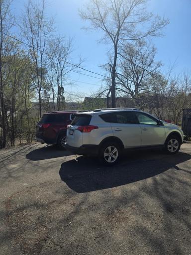 Paved off-street asphalt parking- room for 2+ vehicles or your future garage