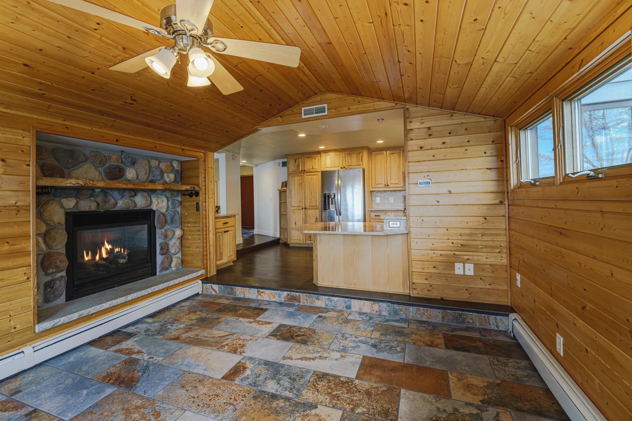 View of the four-season porch looking towards the kitchen.