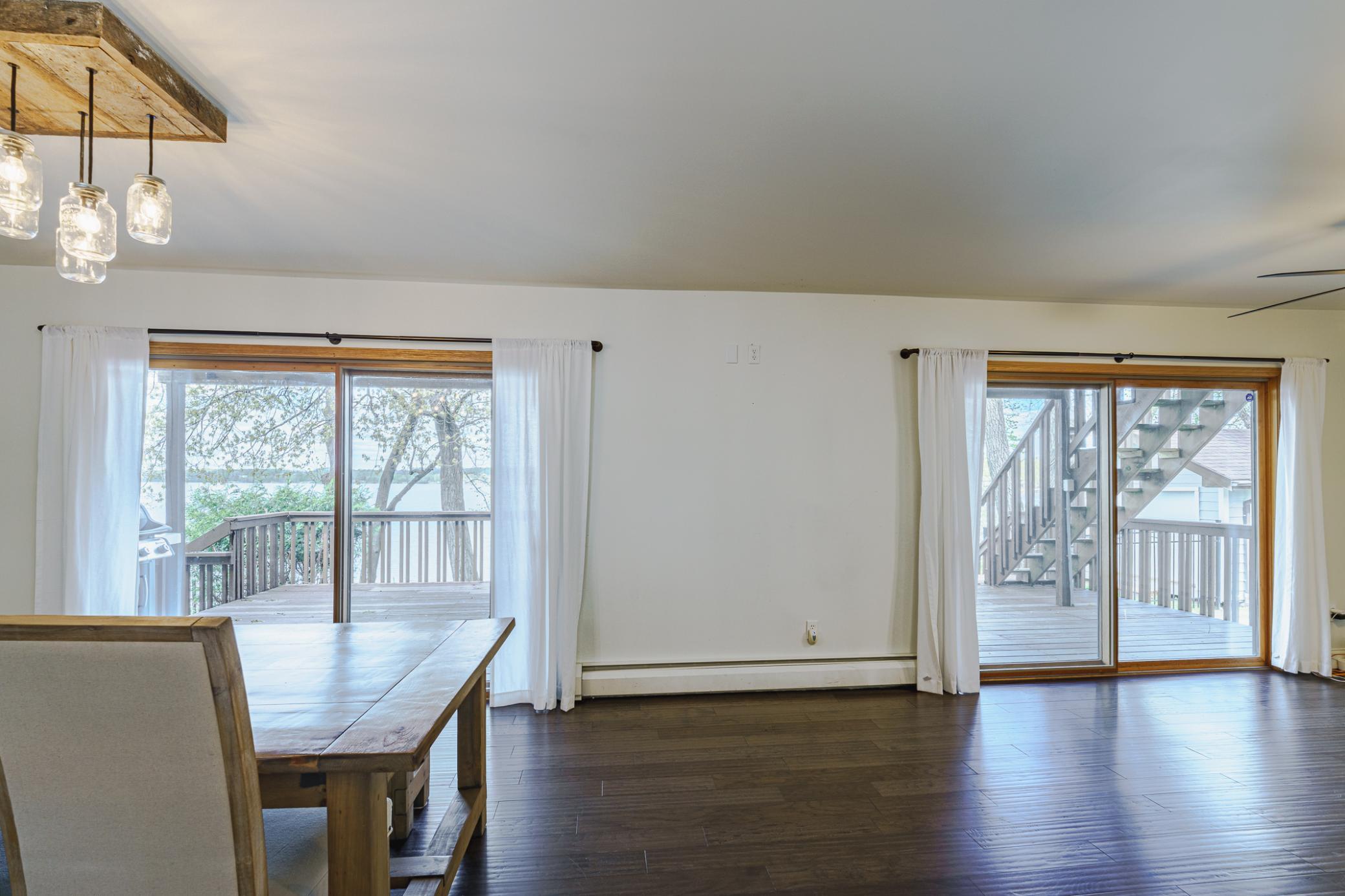 Double patio sliders from the dining and living rooms lead to the deck.