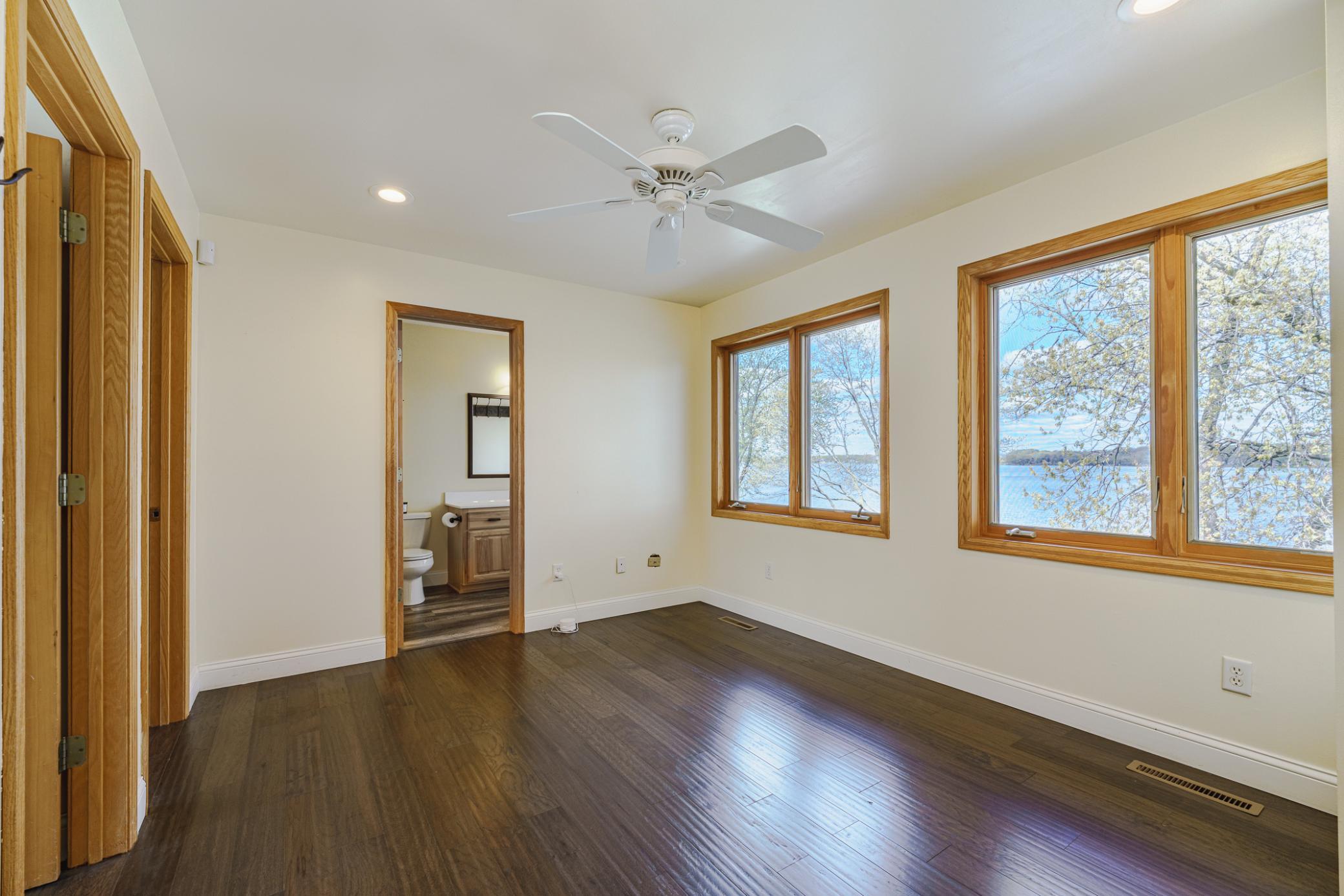 This loft on the second floor takes in sweeping lake views, and opens to four bedrooms and a full bathroom.