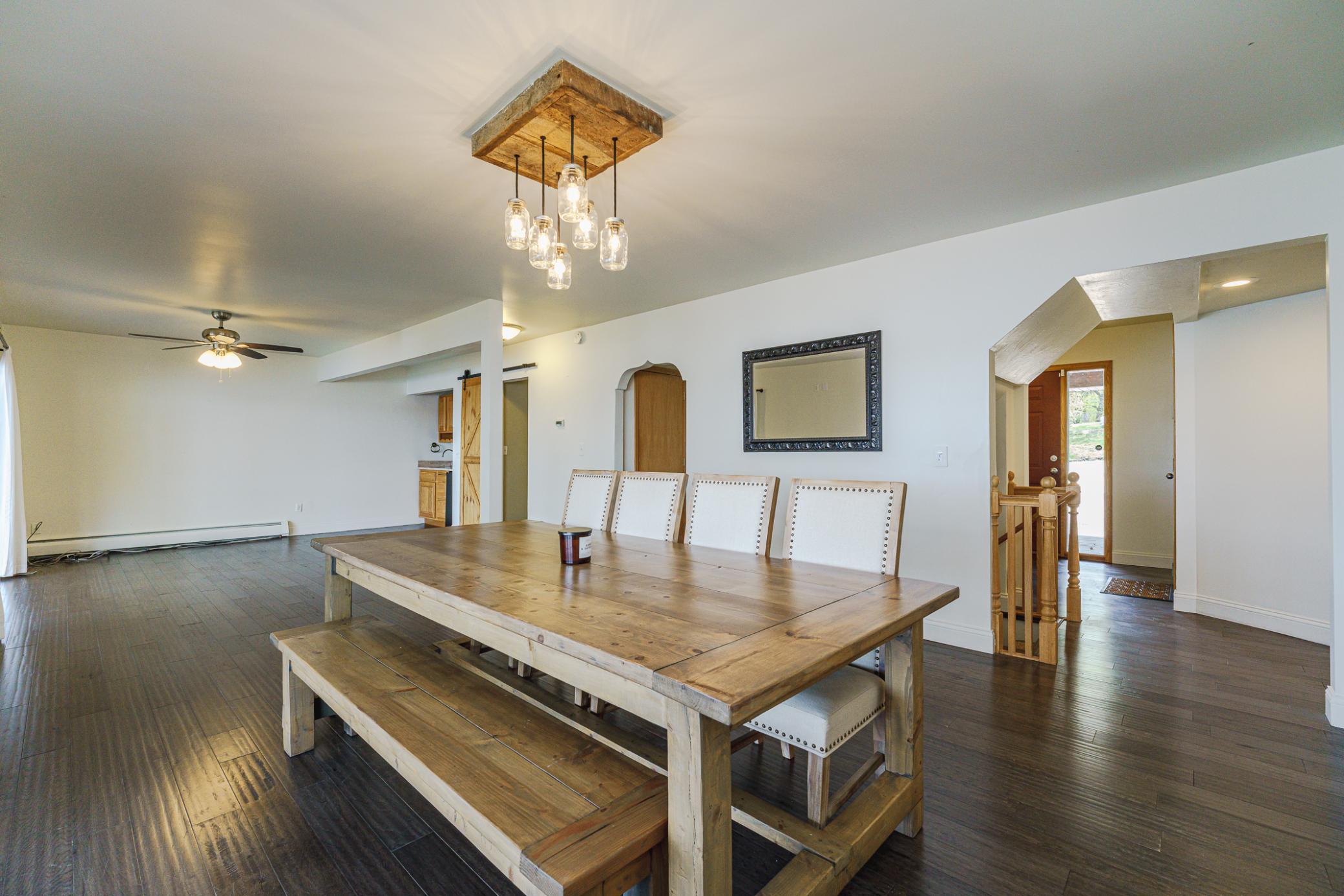 The dining room opens to the kitchen and entry all. This room can accommodate your LONGEST table!