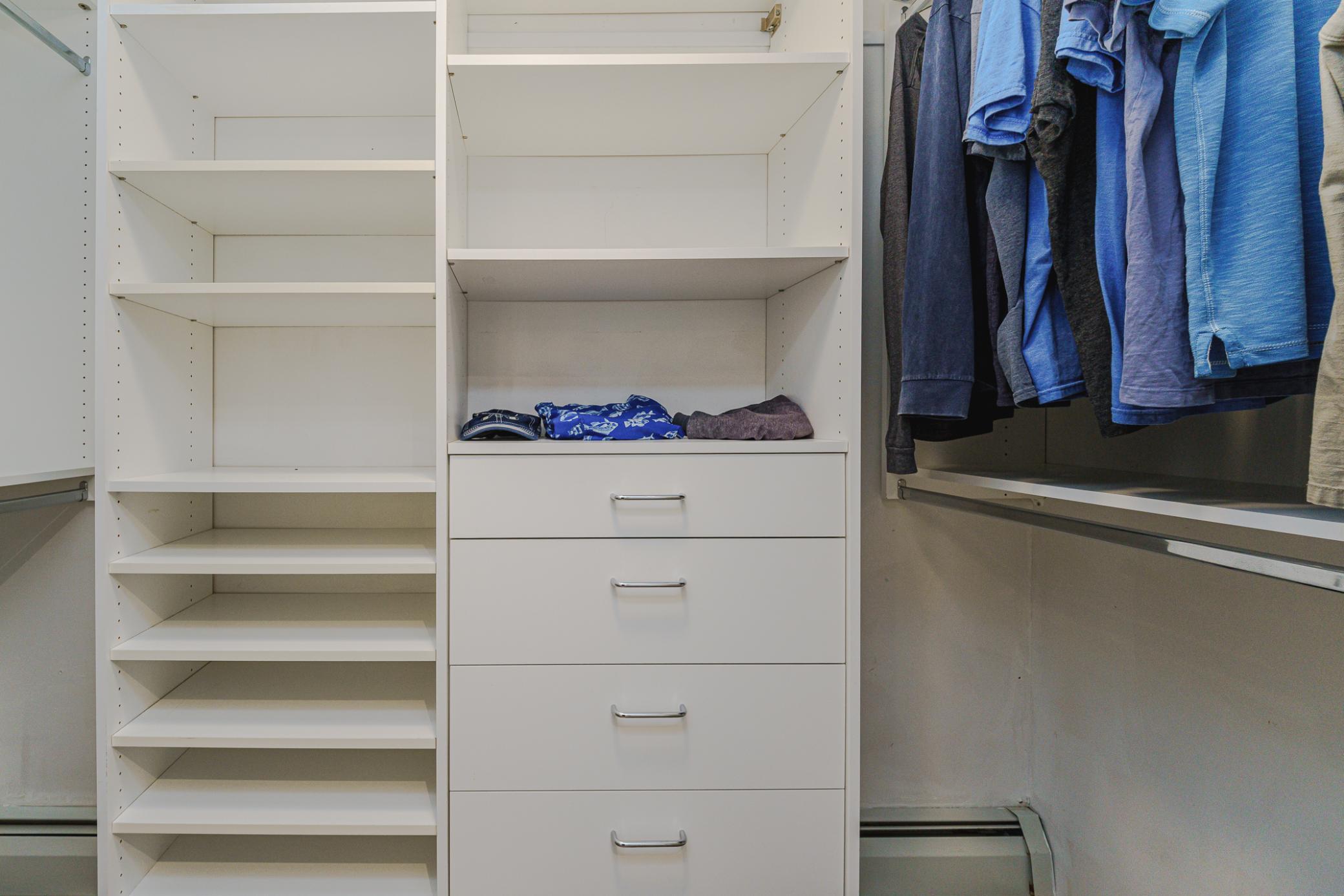 Custom closet - this is one of two walk-in closets in the primary suite.