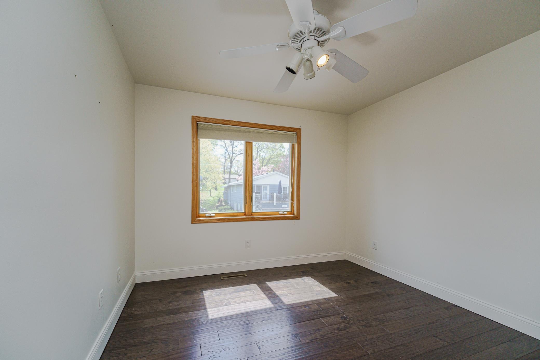 This is one of four upper level bedrooms. This room is one of two near the loft.
