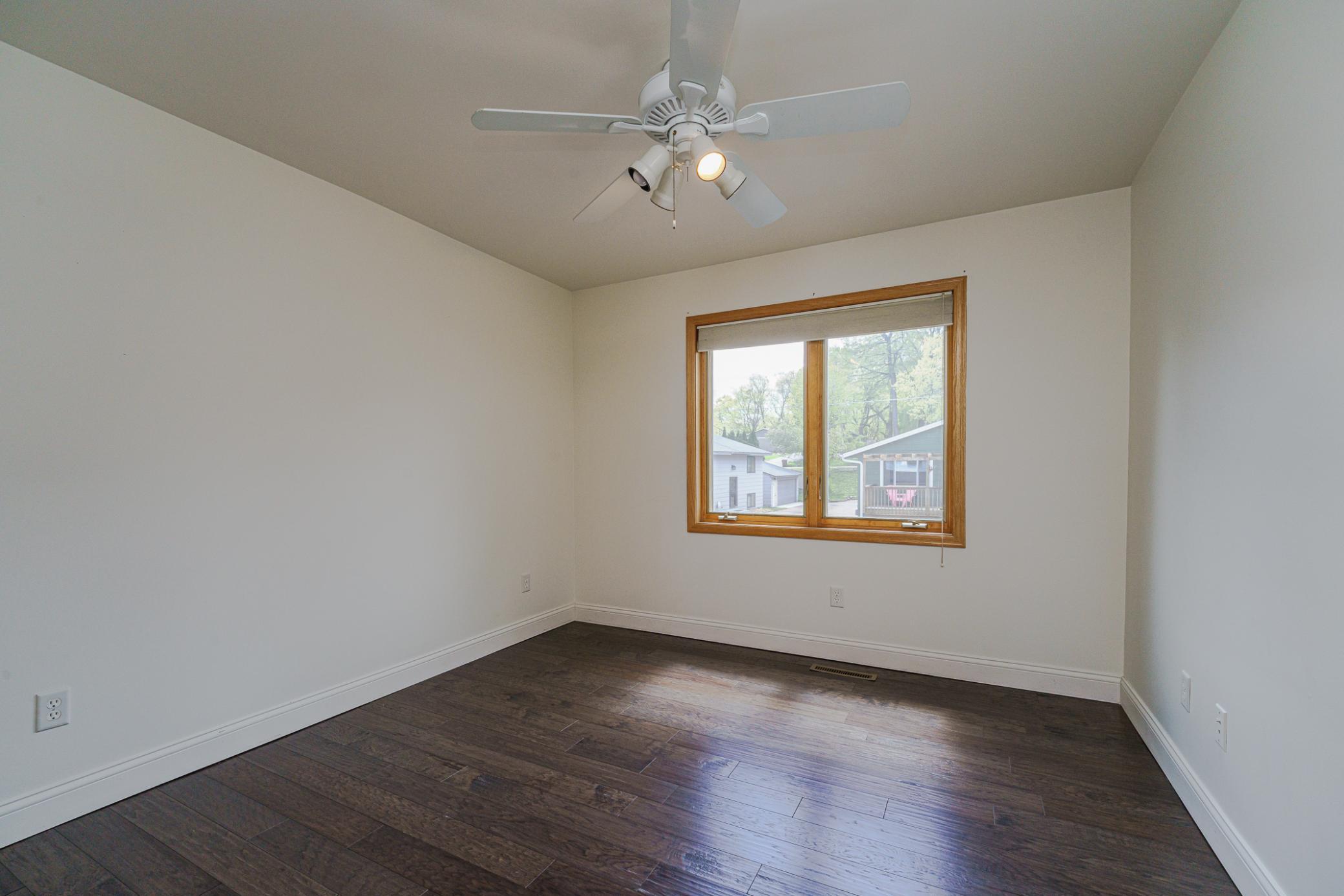 This is one of four upper level bedrooms. This room is one of two near the loft.