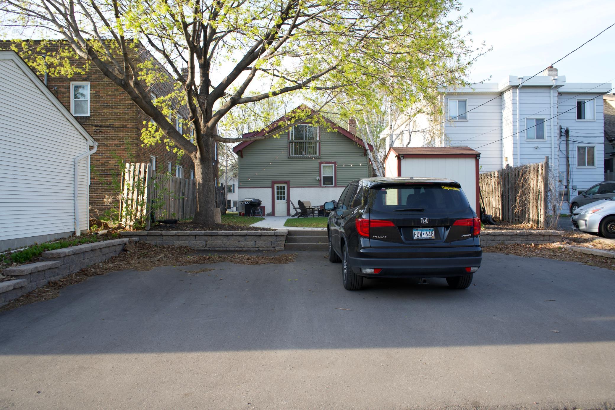 3 car parking pad. Storage shed. Flat backyard.