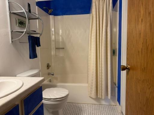 Updated vinyl tub/shower combination with tile floors!