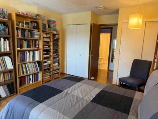 Convenient access to bathroom, linen closet, and large hallway closet. This unit has 5 in-unit storage closets and additional cabinet storage above the garage stall.