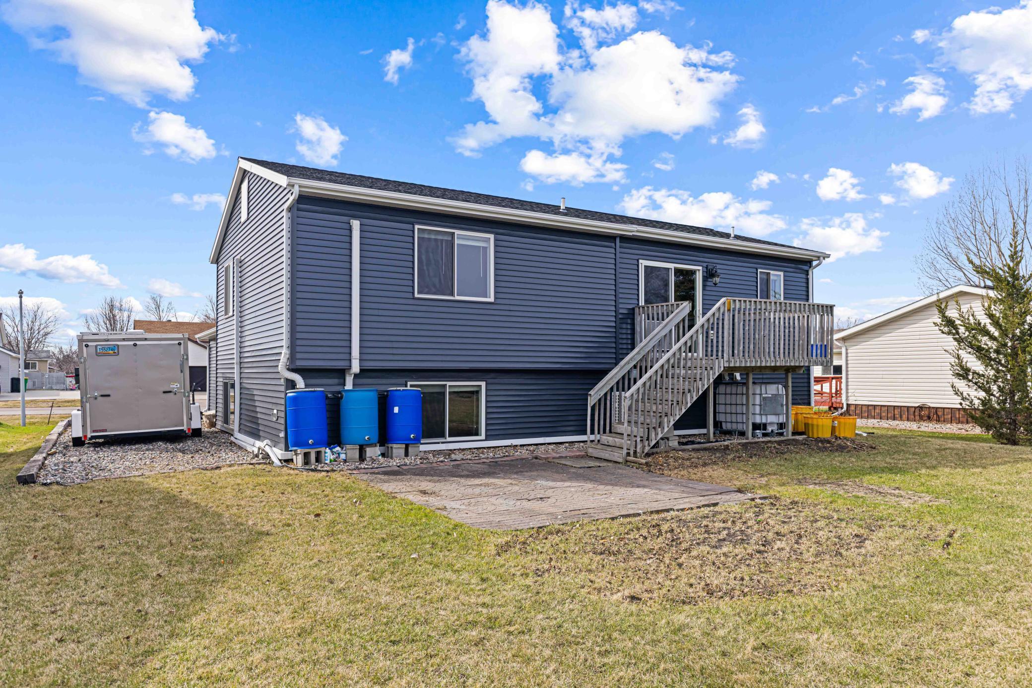 Wood deck with lower level paver patio