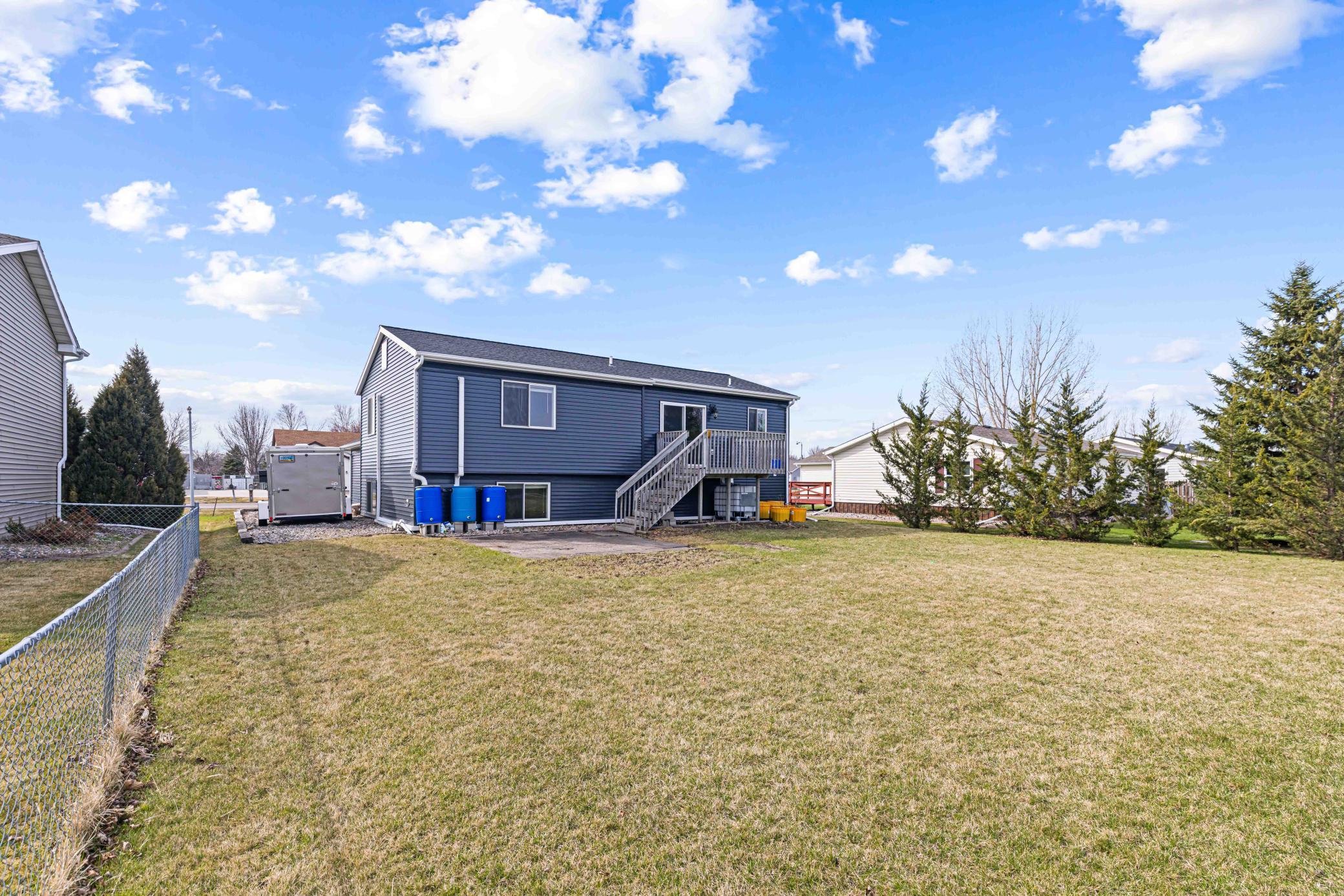 Extend gravel parking pad by garaged