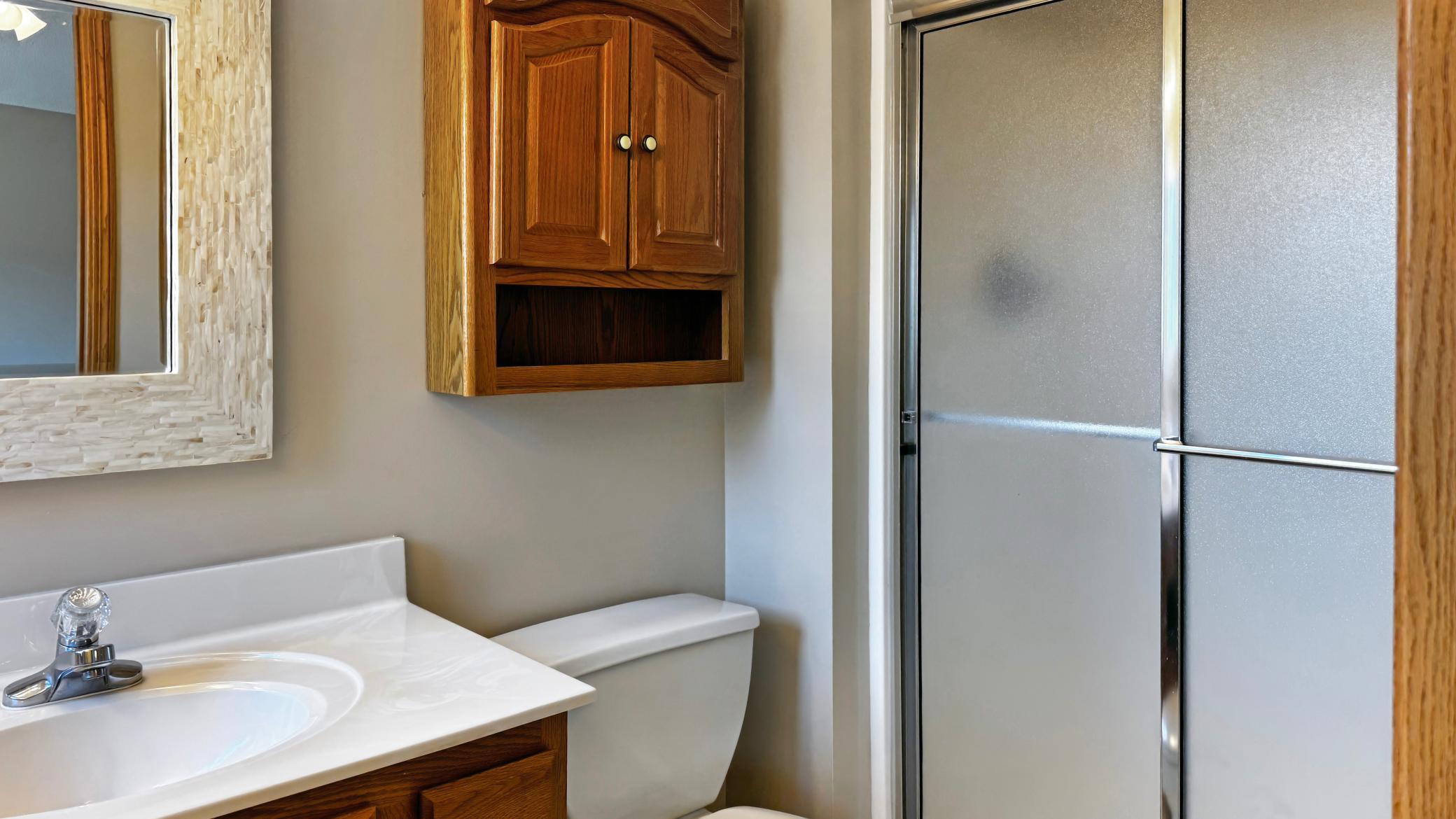 The primary bathroom has a large walk-in shower