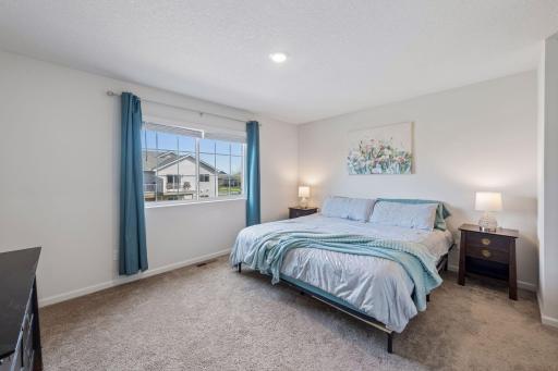 Primary w/two closets -walk through to bath