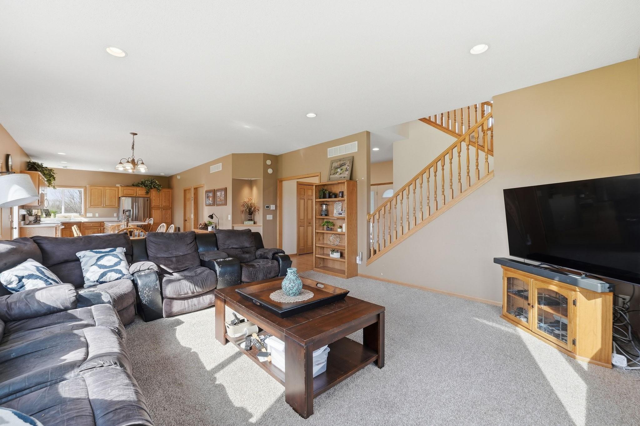 Living Room Area Open to DR and Kitchen