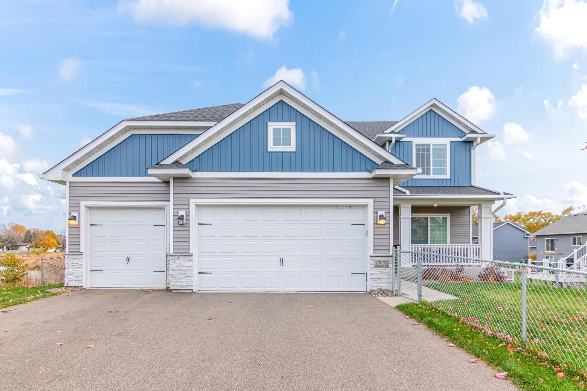 17975 Evening Lane – Exterior. 3-car garage, 760 sq ft, with the third stall extra deep at 10' x 30' perfect for a workshop or may accommodate up to 4 cars.