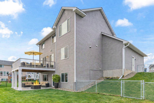 Host gatherings, fire up the BBQ, or simply unwind on the maintenance-free deck or the lower-level concrete patio while enjoying the water view. Sunny south facing backyard. Patio/deck furniture is virtually staged.