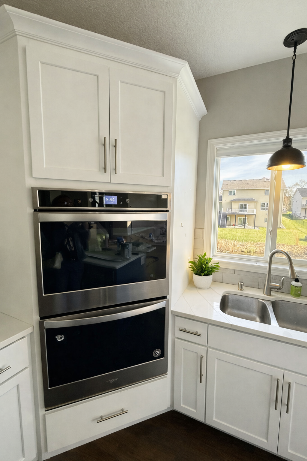 Double ovens make cooking and entertaining especially on Holidays a breeze, and the kitchen window offers a lovely view of the backyard and the water.