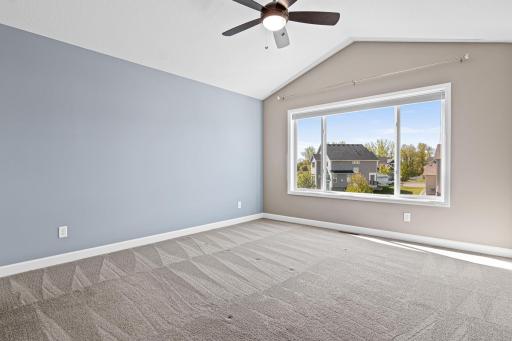 The ownerâs suite is vaulted, bright, and filled with light, featuring a large southern exposure window the peaceful water views.