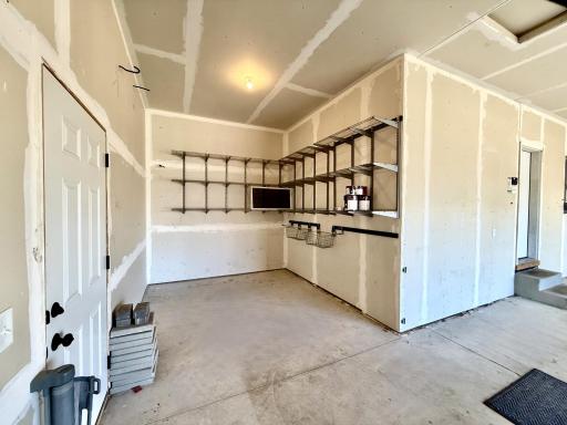 Fully insulated garage. close up of the extra (4th) stall or workshop.