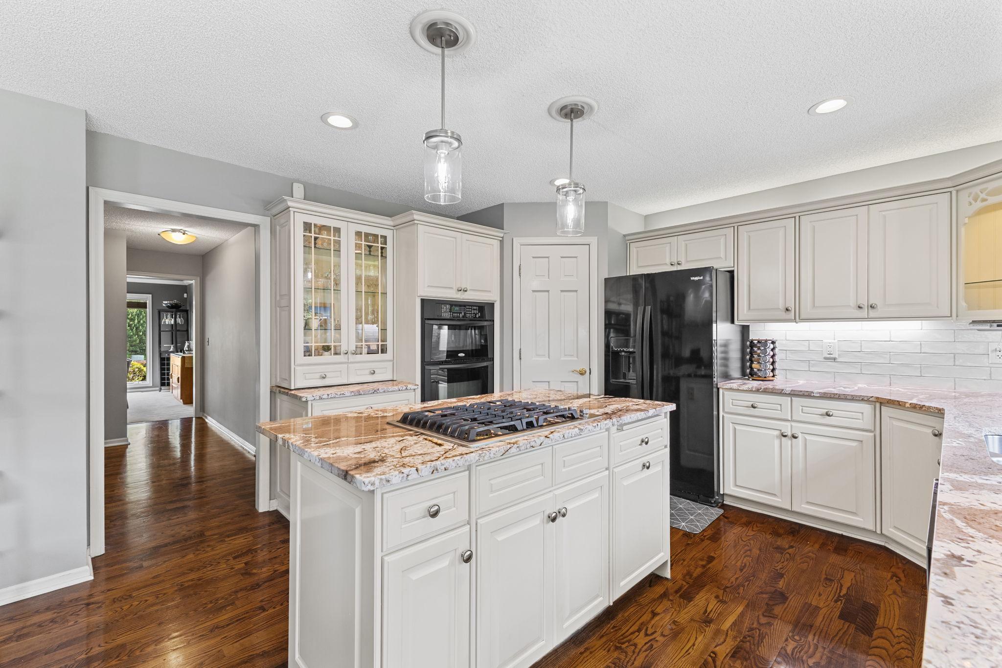 The abundance of cabinet storage and spacious walk-in pantry offers a place for all your belongings, keeping your family organized.
