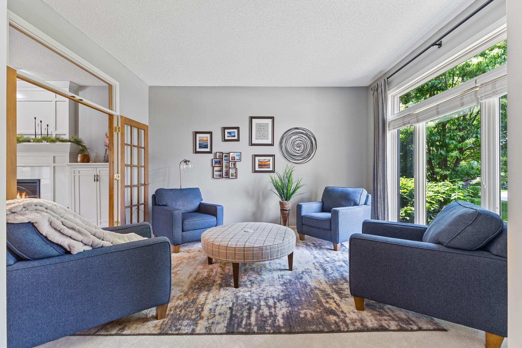 The front sitting room is filled with natural light. Most windows throughout have been updated with Marvin ultimate clad windows (2017).