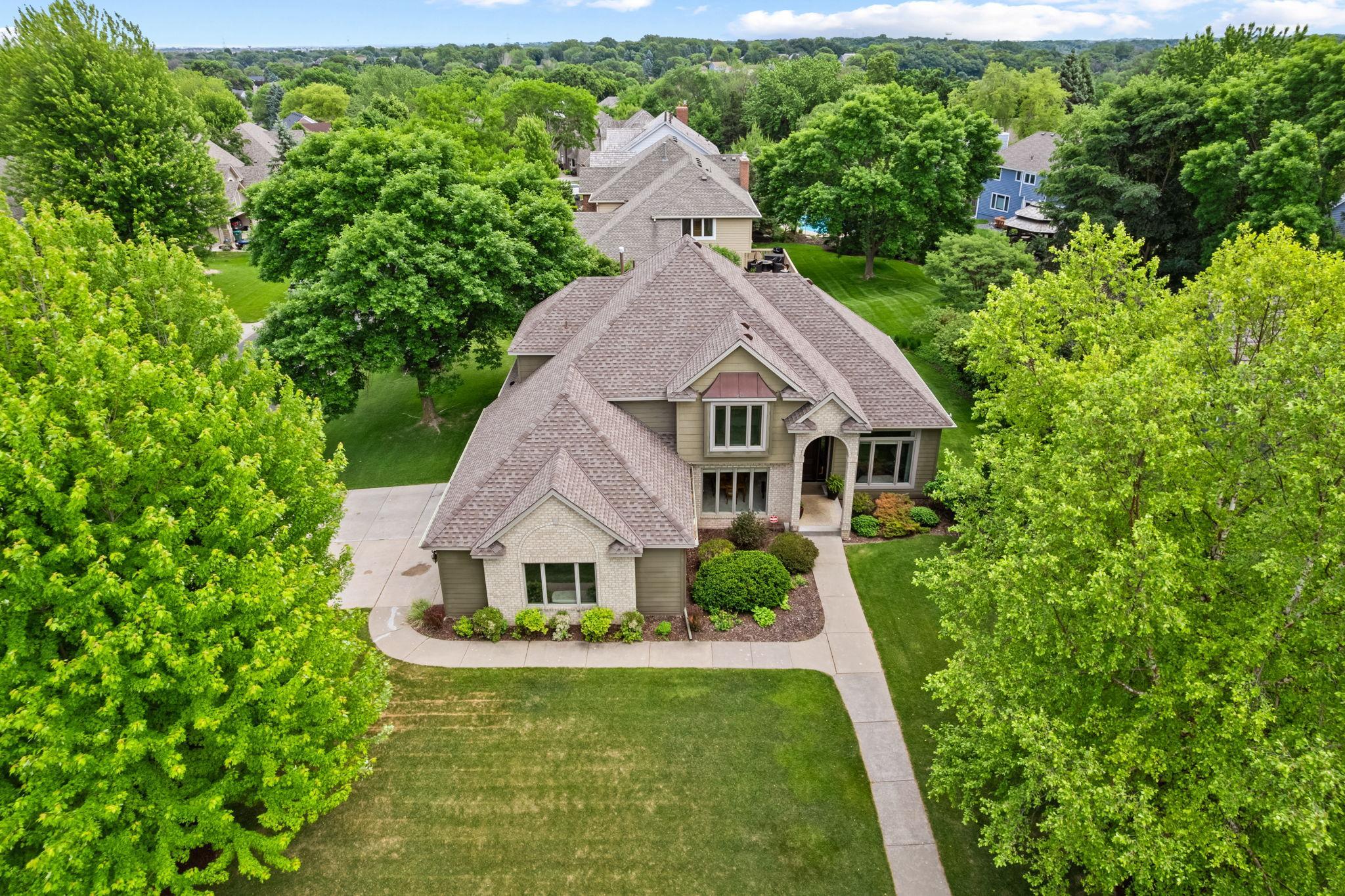 Surrounded by lush green space.