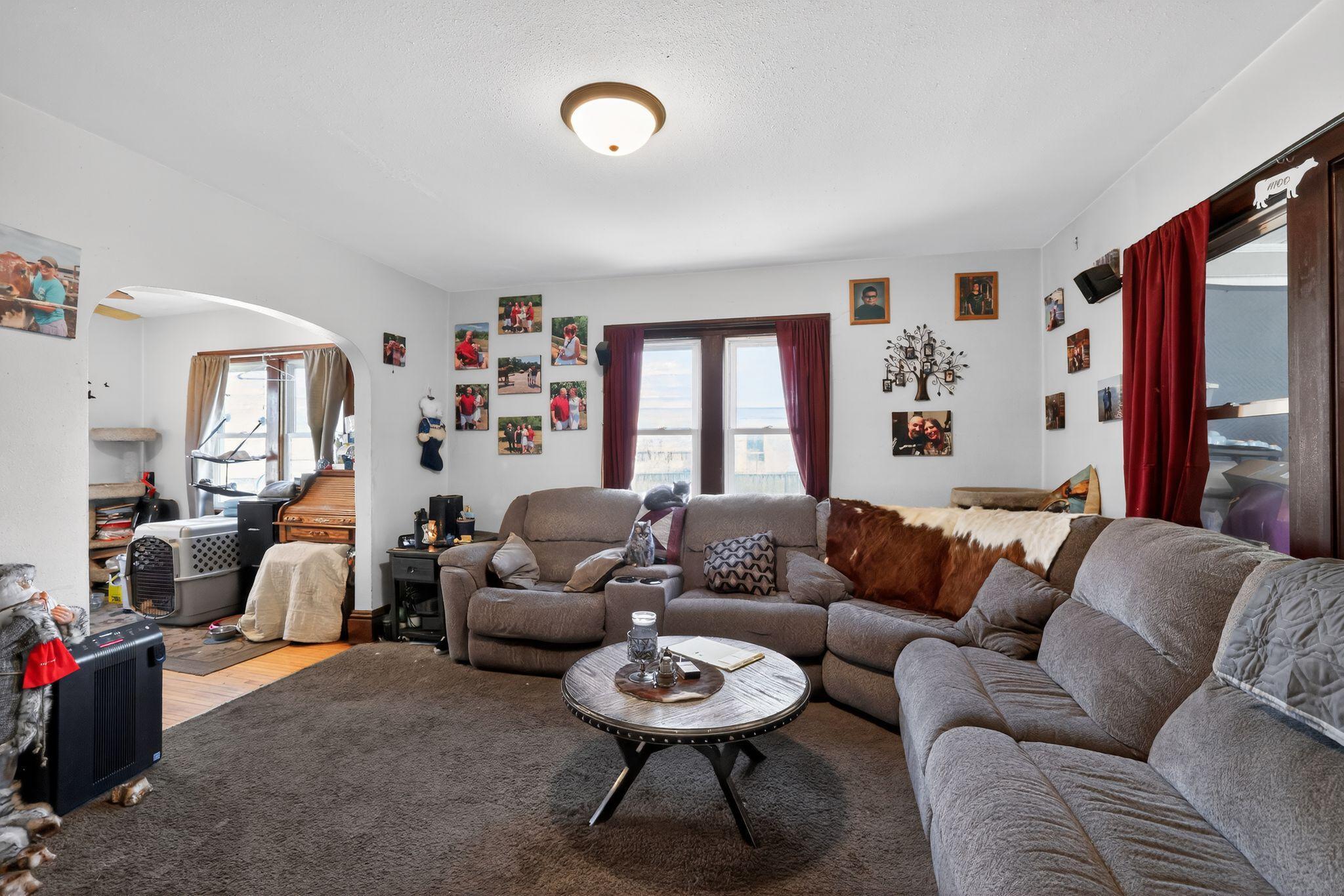 Living Room, hardwood floors underneath carpet