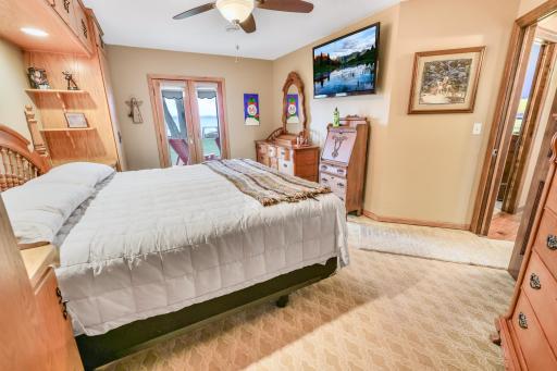 Primary with French doors to lakeside