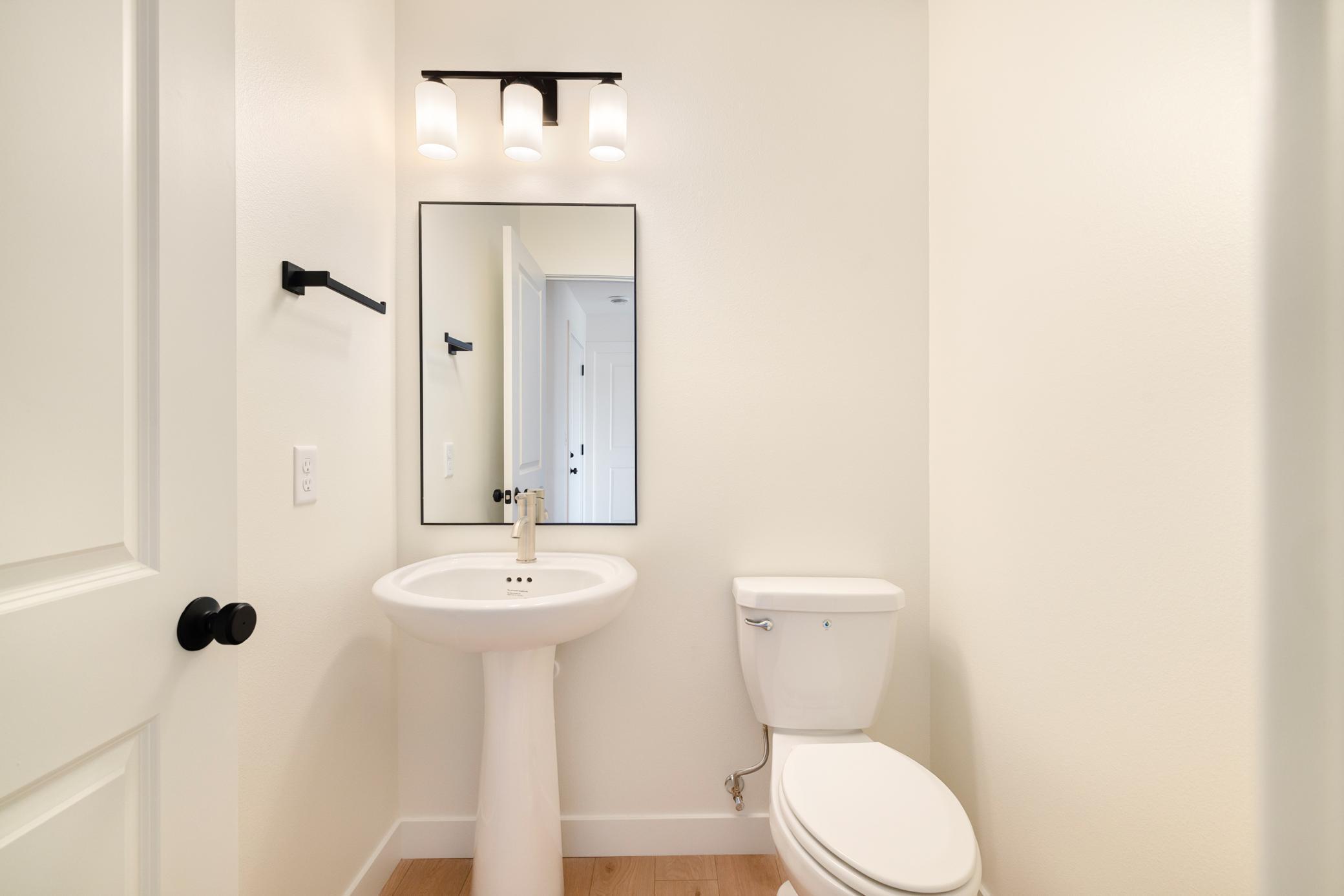 9 Previous model - main floor powder bath.jpg