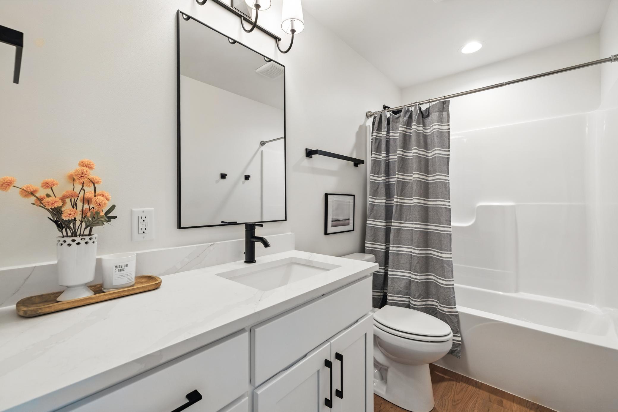 19 Previous model - guest bath quartz included.jpg