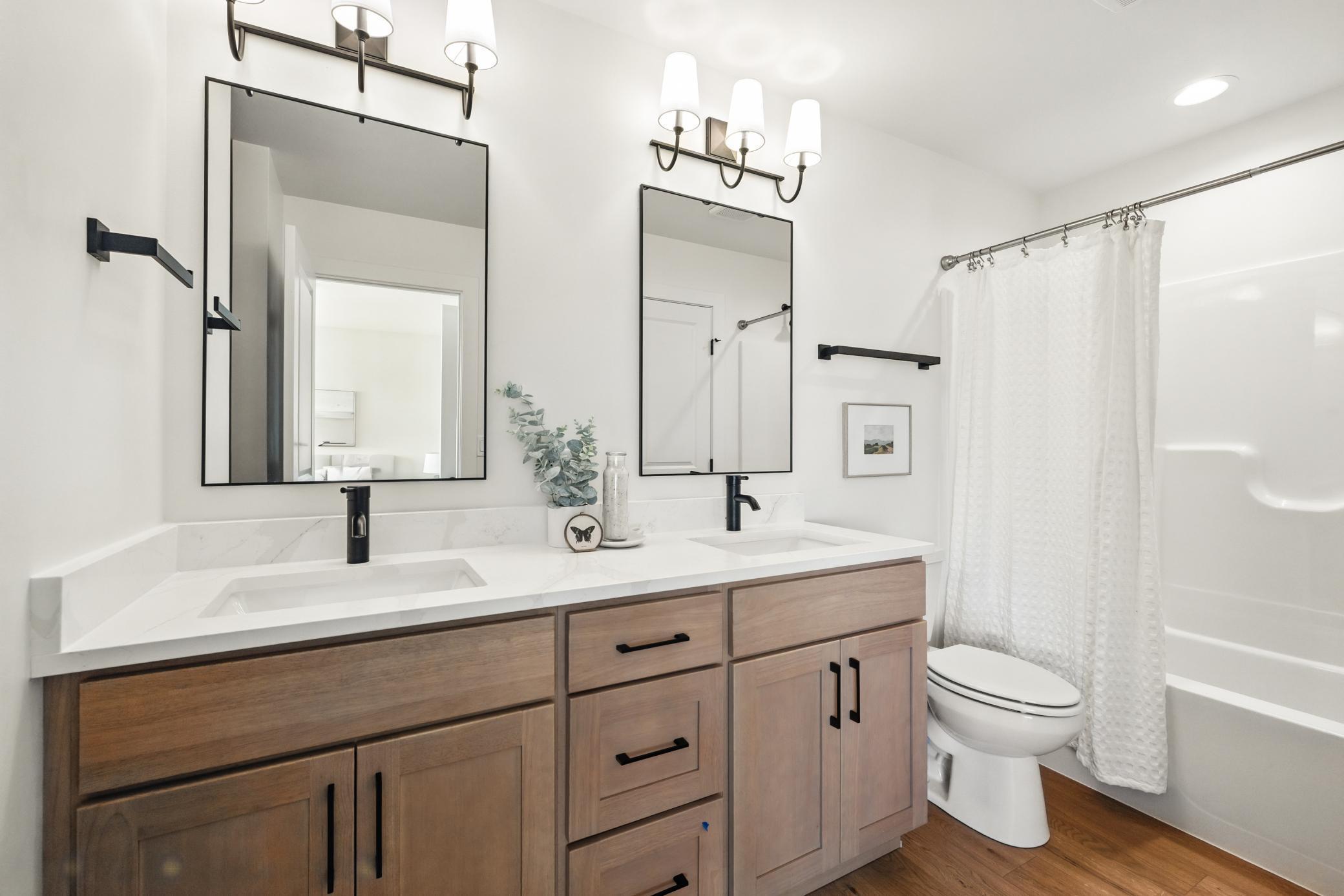 14 Previous model - master suite double sink included.jpg