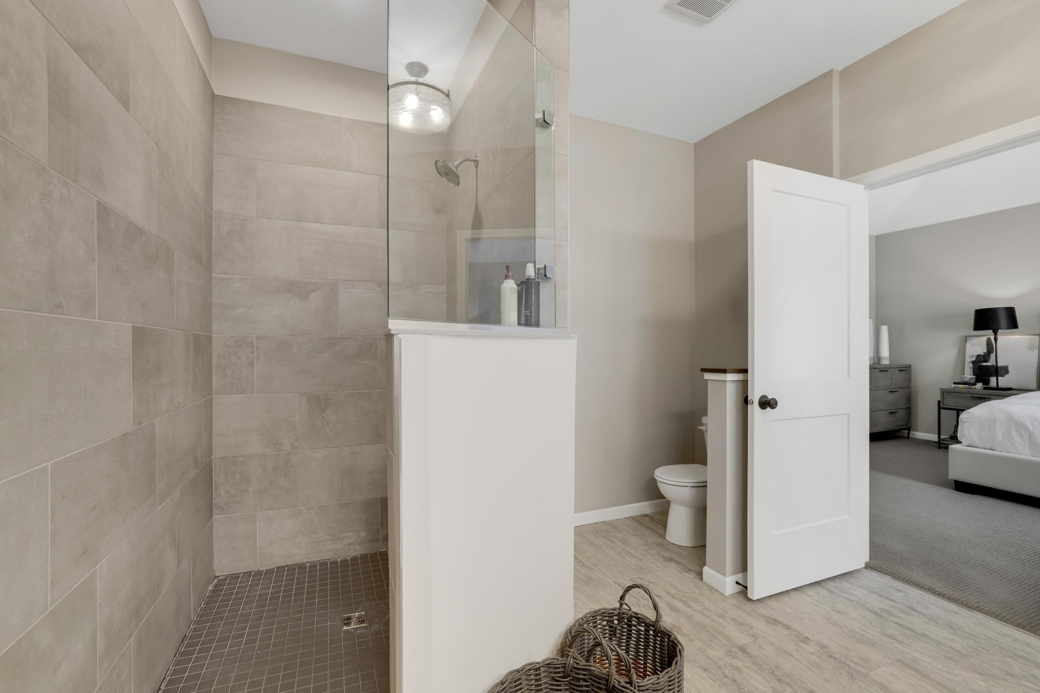 This walk-in tiled shower is everything!