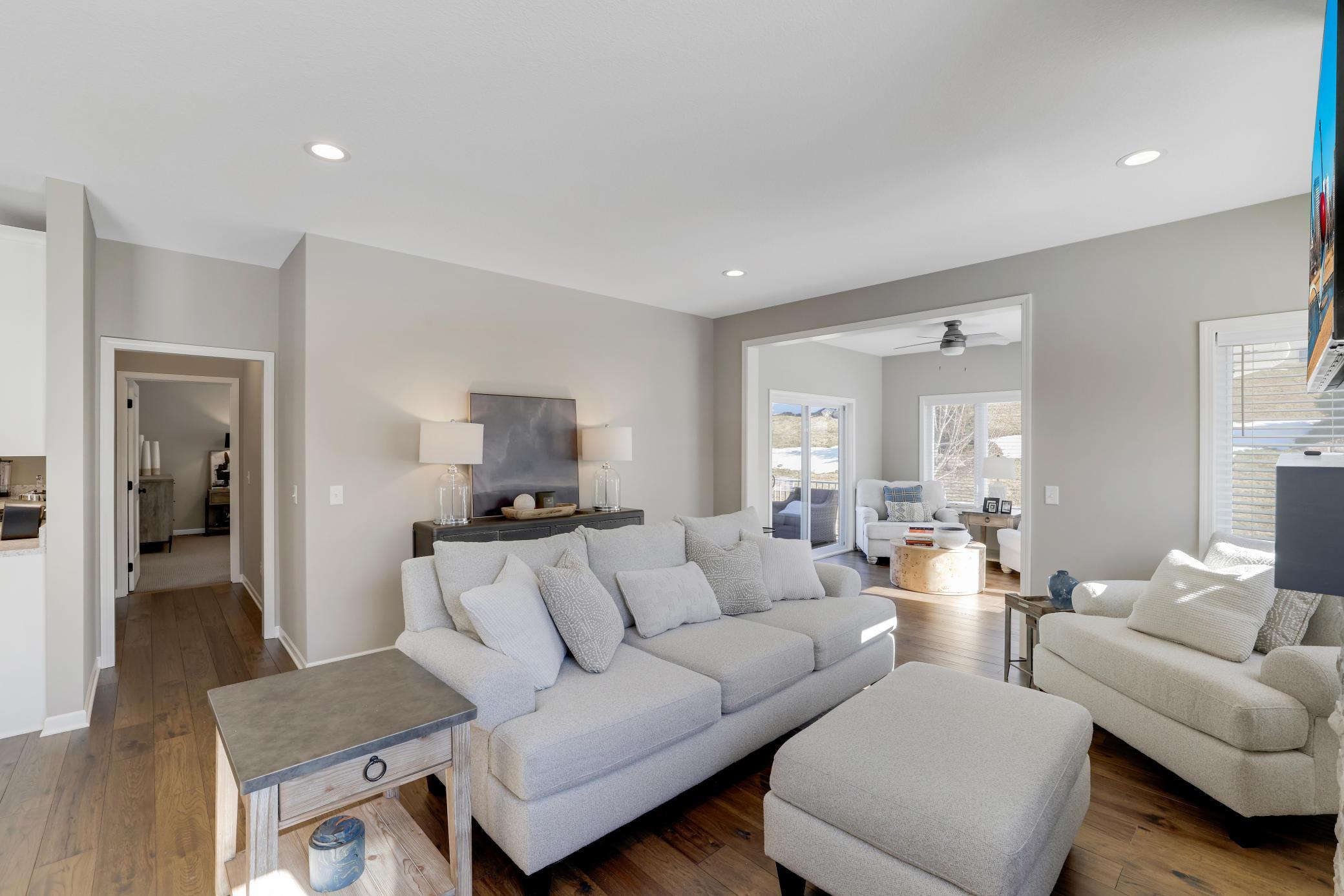 Another view of the main level living space as it opens into the sunroom.