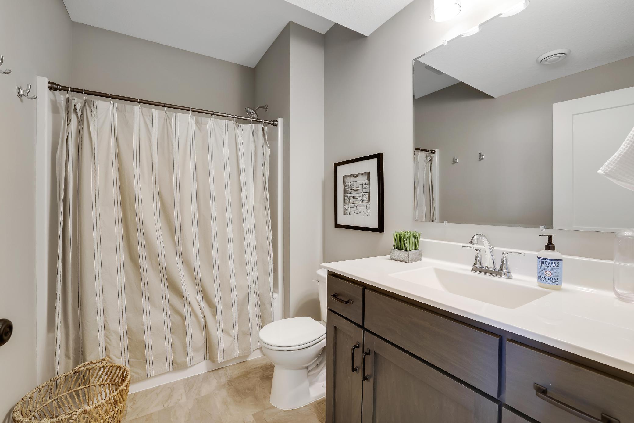 This lower level FULL bathroom is the perfect spot for your guests spending the night, the weekend or the week! They'll feel right at home with everything they need in here.