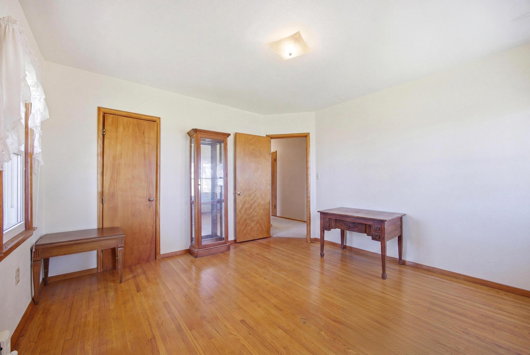 Bedroom 2 - Main Level (personal property digitally removed)