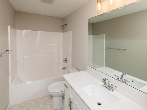 PHOTO OF A DIFFERENT HOME WITH SIMILAR PLAN. FINISHES MAY VARY. Upper Main Full Bathroom