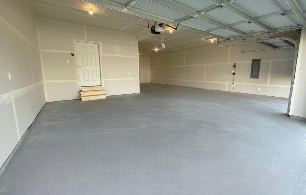 PHOTO OF A DIFFERENT HOME WITH SIMILAR PLAN. Spacious 4 Bay Garage!