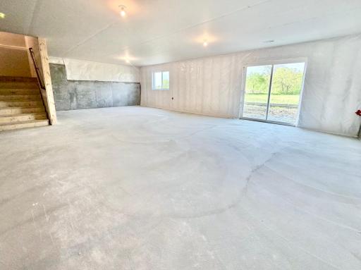 9686 32nd St NE- Home features a walkout lower level ready for future finish!
