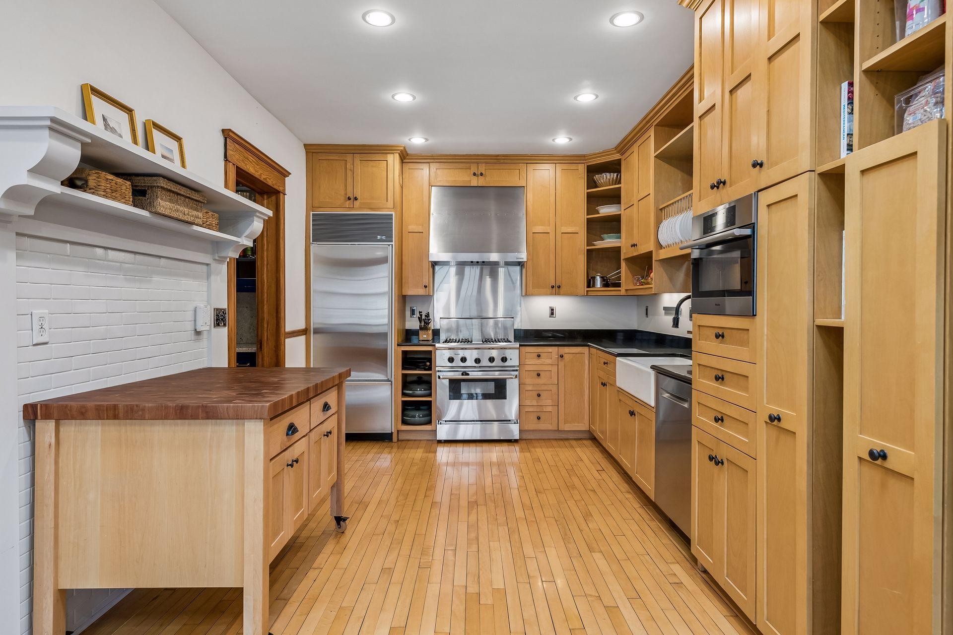 High end appliances and beautiful wood floors !