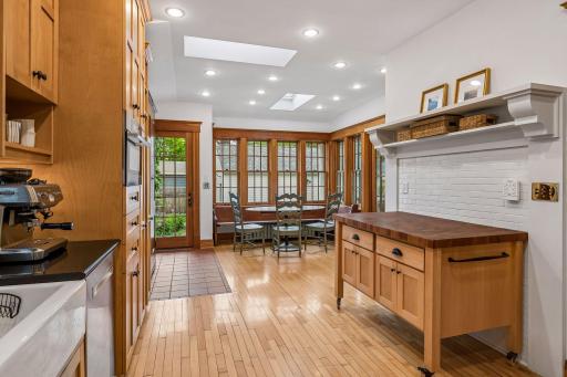 This kitchen has a huge eat in area that can seat up to 8 !