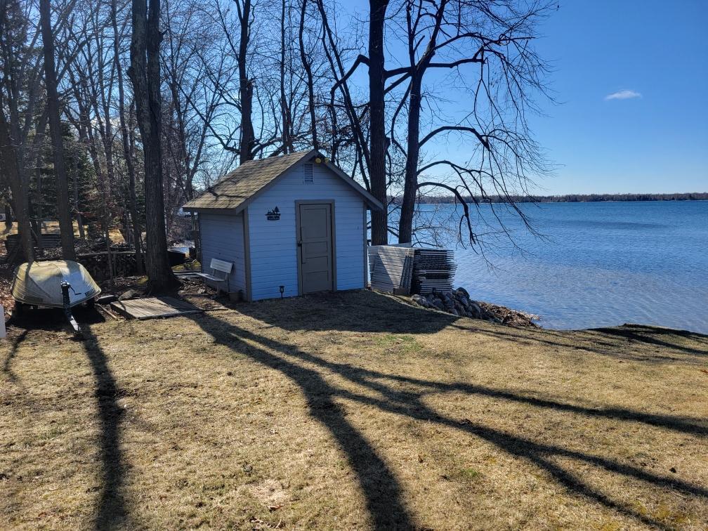 Lake edge shed convienent for the life jackets, fishing gear and lake floaties!