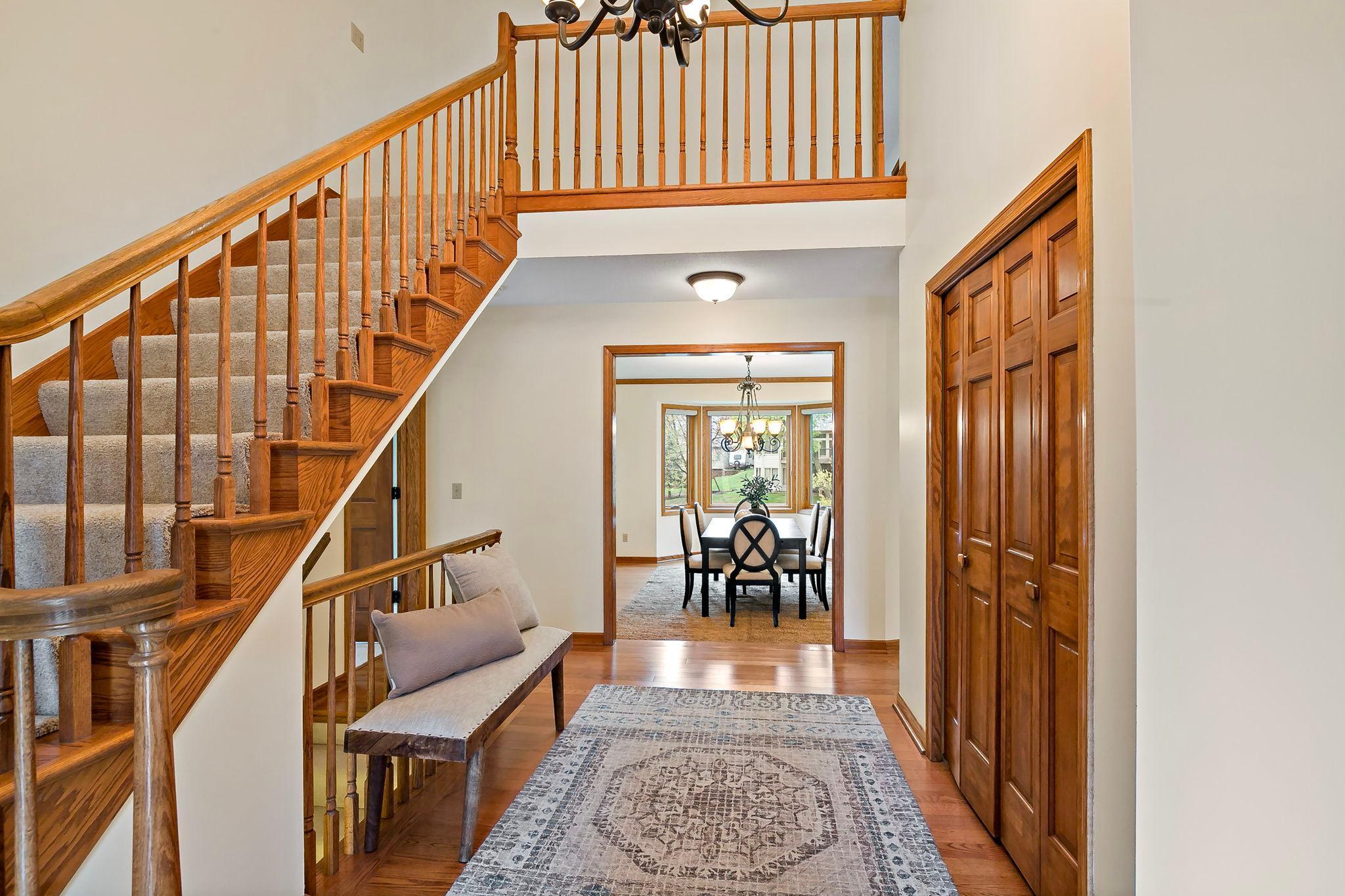 A lovely two-story foyer greets you upon entry.