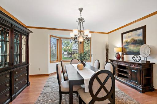 A separate formal dining room overlooks the pond in back.